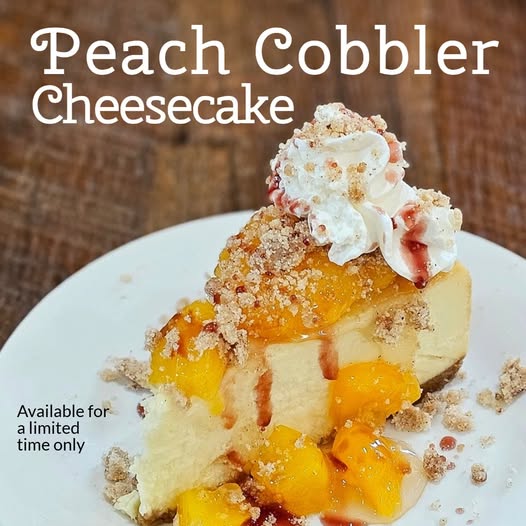 piece of peach cobbler cheesecake