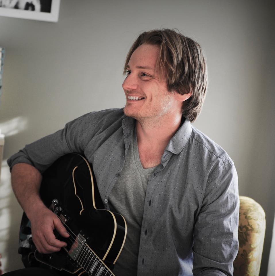 Jimmy Greve with guitar