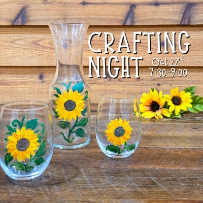 sunflowers on wine glass and carafe