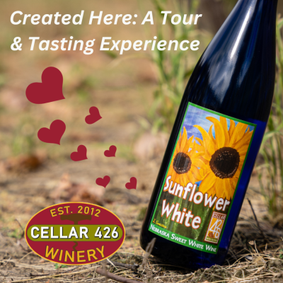 wine bottle in the vineyard with hearts